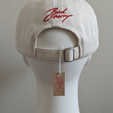 BadCherry Embroidered Logo Cap – Adjustable Cream White Cotton Baseball Hat | Minimal Streetwear Unisex